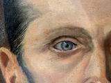 tableau représentant un homme aux yeux bleus, barbu et moustachu