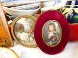 a picture of a little girl in a picture frame on a table
