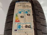 a close up of a tire with a sticker on it