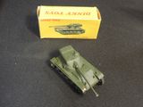 a toy tank sitting next to a box on a table