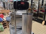 a machine that is sitting on a cart in a store