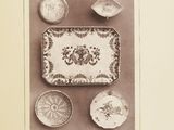 a picture of a picture of a table with plates and bowls on it