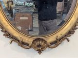 a man taking a picture of himself in a mirror