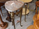 many tables and chairs that are sitting in a room
