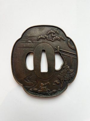 TSUBA en bronze. En forme de Mokko gata, à décor d'un épisod…