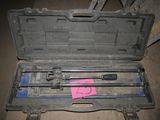 a tool case with tools in it sitting on the floor