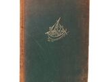 an old book with a picture of a boat on the cover