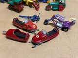a lot of toy cars that are on a table
