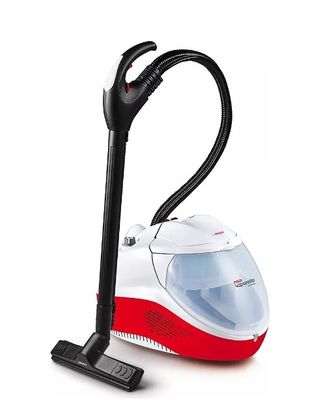 un gros plan d'un aspirateur rouge et blanc posé sur une surface blanche