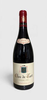 a bottle of wine that is sitting on a table