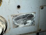 a close up of a machine that has a lot of buttons on it