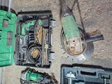 many tools that are laying out on the ground