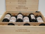 a wooden box with six bottles of wine in it