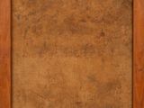 an old wooden picture frame with a brown paper on it