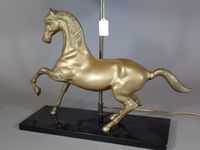 Lampe en laiton en forme de cheval en marche. (photo 2)