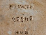a close up of a plate with a name on it