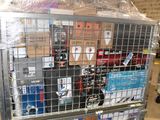 a metal cart with many items in it in a warehouse