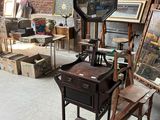 a room with a lot of old furniture in it