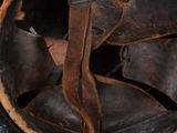 a close up of a helmet with a strap on it