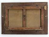an old wooden frame with two open doors on a white wall