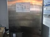 an image of a stainless steel refrigerator in a kitchen