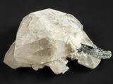 a close up of a rock with a piece of rock on it
