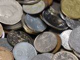 a pile of coins sitting on top of each other