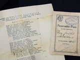 an old document with a piece of paper on top of it
