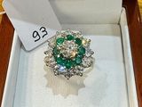 a ring that is sitting in a box with a price tag