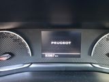 the dashboard of a car with gauges and numbers on it