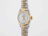 a lady ' s rolex watch with a white dial and two tone bracelet