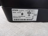 a label on the back of a printer that says epson
