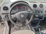dashboard view of a car with a steering wheel and dashboard gauges