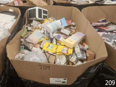 many boxes of assorted items in a pile