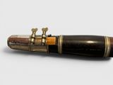 a pen that is sitting on top of a table