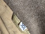 a close up of a shirt with a tag on it