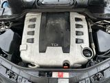 a picture of a car engine with its hood open