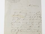 a letter written in black ink on a piece of paper