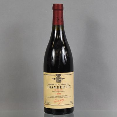 a bottle of wine that is sitting on a table