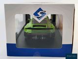 a box with a toy car inside of it
