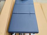 a blue table that is sitting in a cardboard box