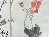 a picture of a painting of flowers on the wall