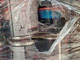 a picture of a fire hydrant in the middle of a pile of plastic wrap