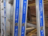 several ladders that are stacked on top of each other