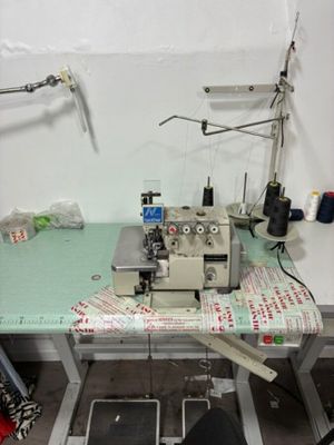 a sewing machine sitting on a table in a room