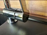 a close up of a faucet on a counter in a kitchen
