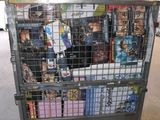 a large metal cart with a bunch of books on it