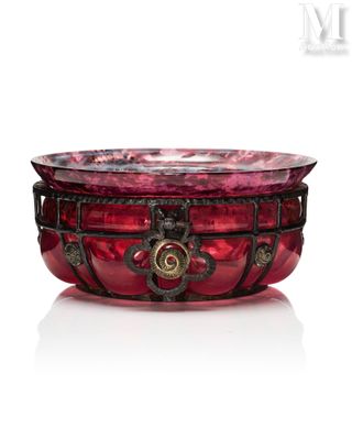 an image of a red glass bowl sitting on top of a white surface