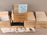 several boxes filled with various types of cards sitting on top of a table