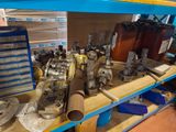 many different types of valves on a shelf in a store